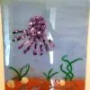 Glass Mosaic Purple Octopus Swimming Above The Ocean Floor