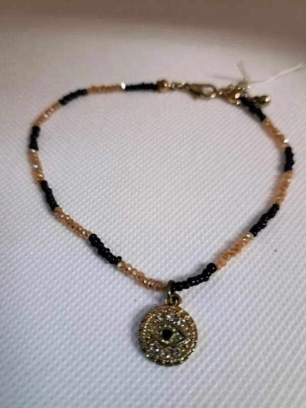 Mystic Tan And Black Crystal Bracelet With Seeing Eye Charm