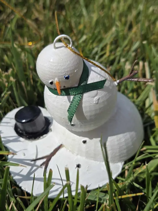 Melty Snowman Ornament With Green Scarf