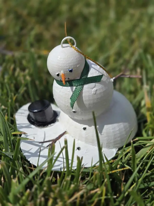 Melty Snowman Ornament With Green Scarf