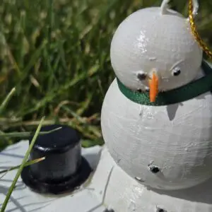 Melty Snowman Ornament With Green Scarf