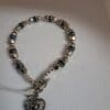 Luxurious Faceted Silver Bead Bracelet Interspersed With Blue Crystals