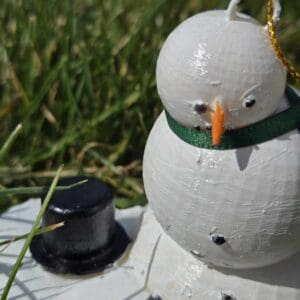 Melty Snowman Ornament With Green Scarf